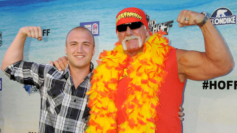 Nick and Hulk Hogan flexing