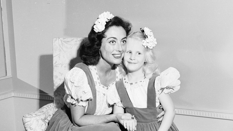 Joan and Christina Crawford posing together