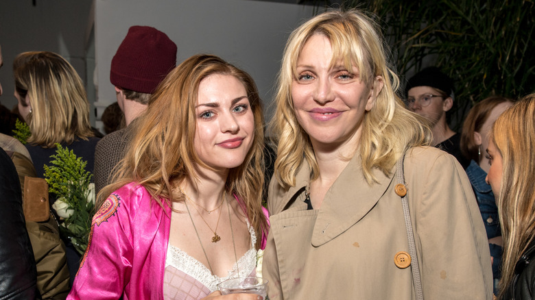 Frances Bean Cobain and Courtney Love posing together
