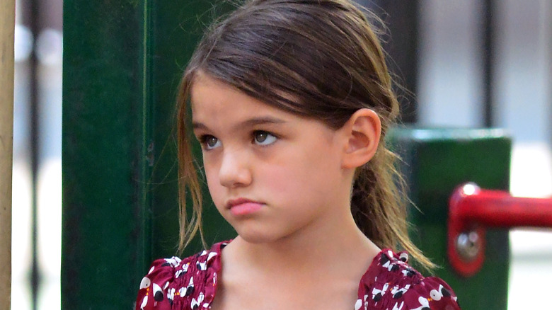 Suri cruise frowning 