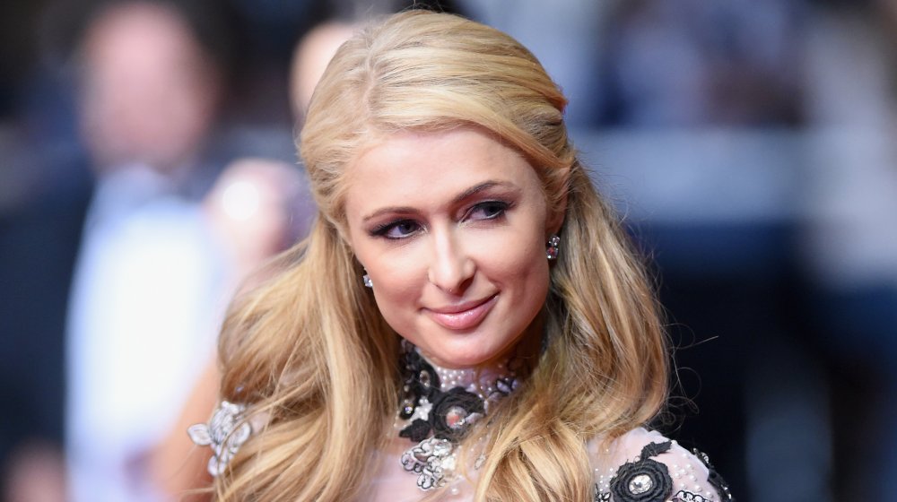 Paris Hilton smiling on the red carpet 