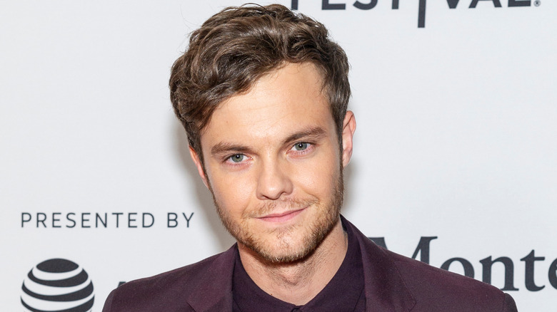 Jack Quaid smiling