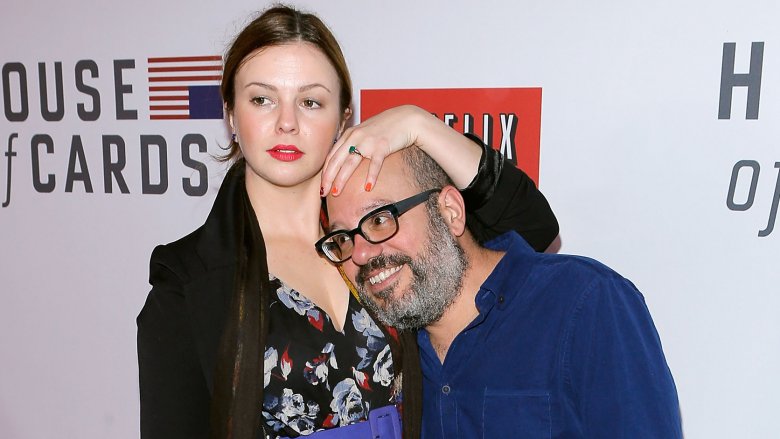 Amber Tamblyn and David Cross striking a silly pose 