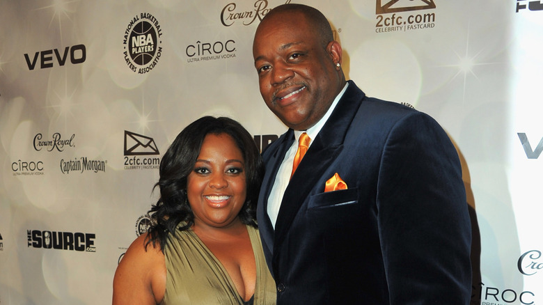 Sherri Shepherd and Lamar Sally posing on the red carpet