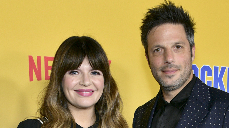 Casey Wilson and David Caspe smiling