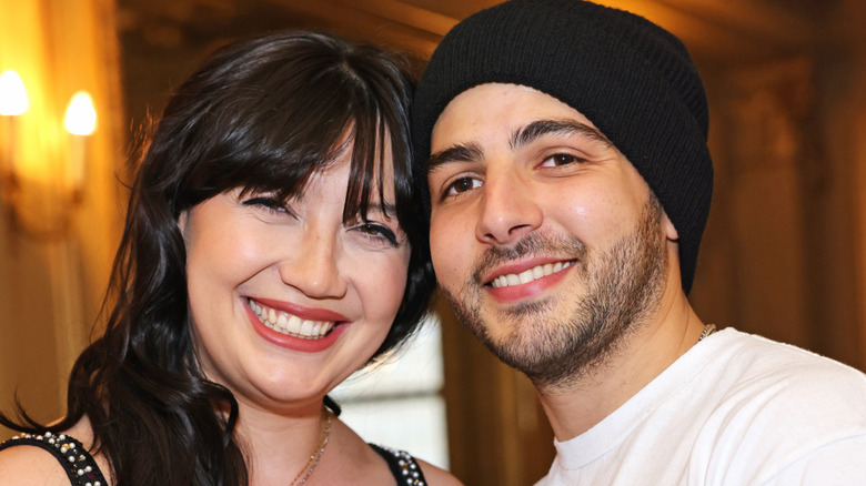 Daisy Lowe and Jordan Saul smiling