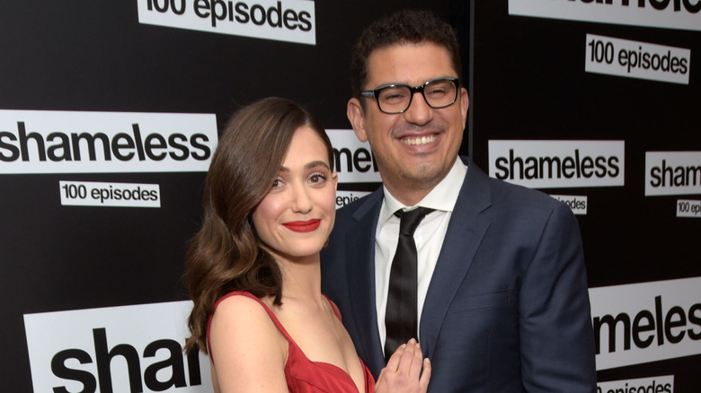 Emmy Rossum and Sam Esmail posing