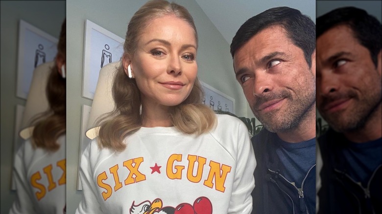 Mark Consuelos looking at Kelly Ripa