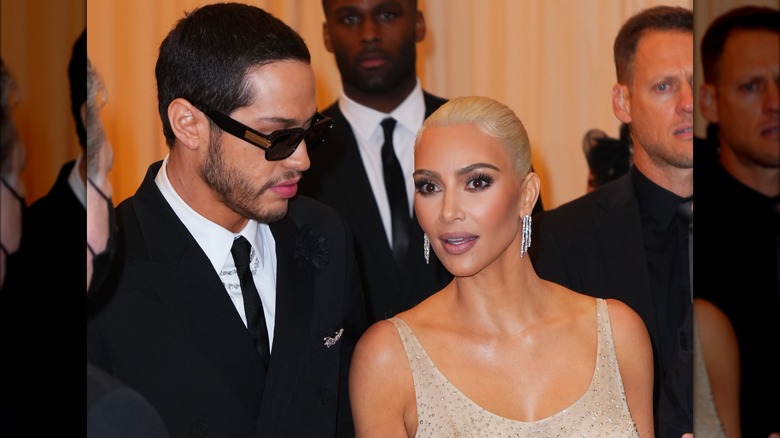Pete Davidson looking at Kim Kardashian