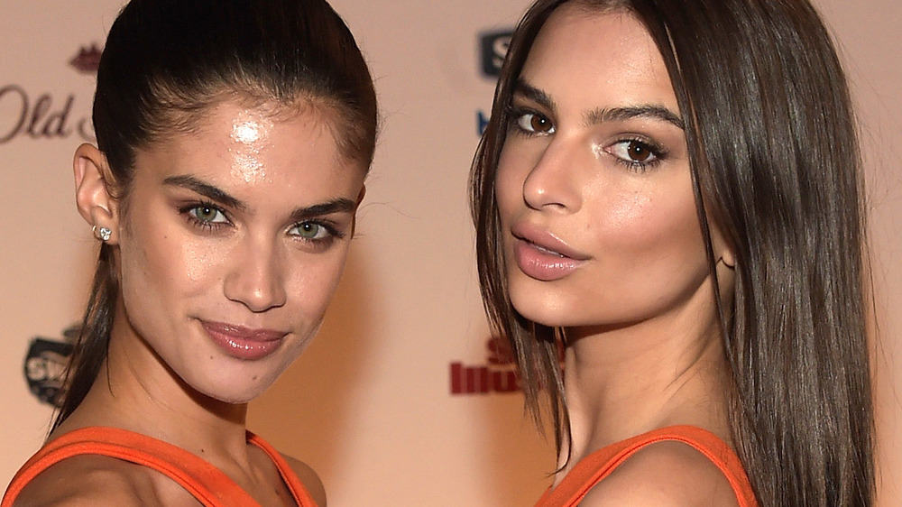 Sara Sampaio and Emily Ratajkowski wearing matching dresses 