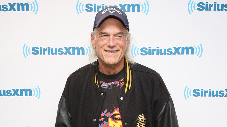 Jesse Ventura with hat, smiling