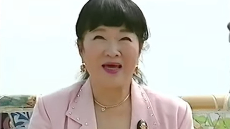 Voice actress Nobuyo Oyama smiling while being interviewed