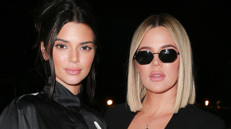 Kendall Jenner and Khloe Kardashian at a charity poker tournament