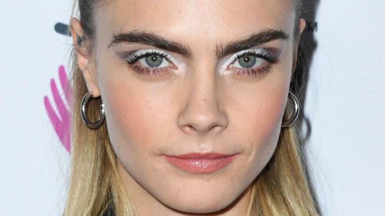 Cara Delevingne looking at camera