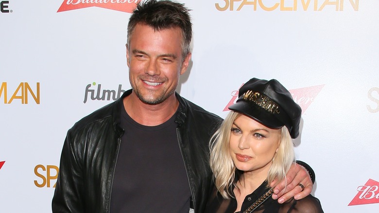Josh Duhamel with Fergie, both posing