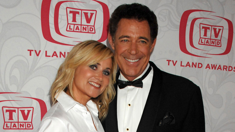 Barry Williams and Maureen McCormick smiling