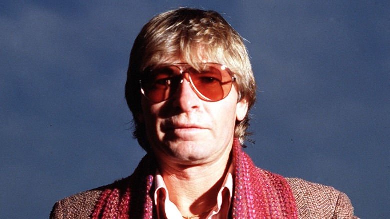 John Denver posing for a picture