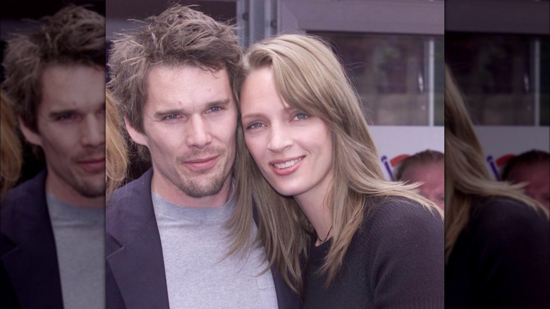 Uma Thurman leaning toward Ethan Hawke