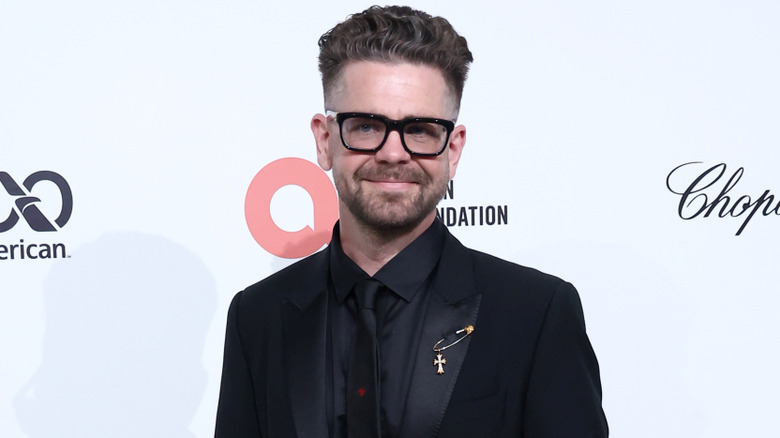 Jack Osbourne posing on the red carpet a few days after welcoming his fifth child