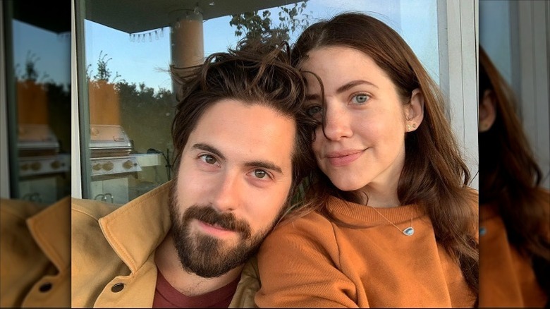 Julie Gonzalo and Chris McNally pose for a selfie