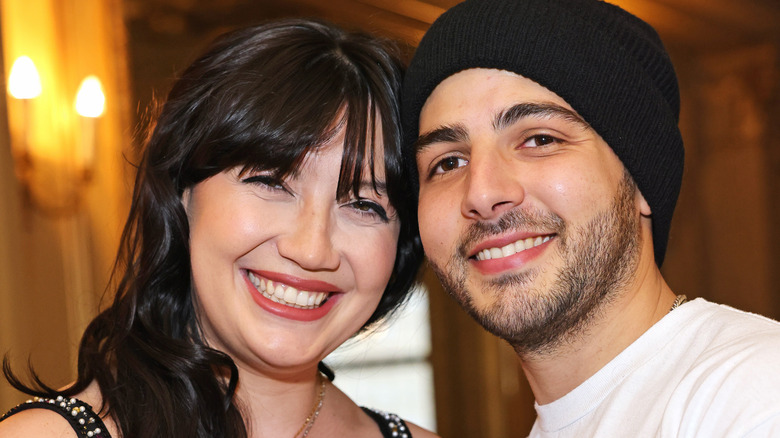Daisy Lowe and Jordan Saul smiling