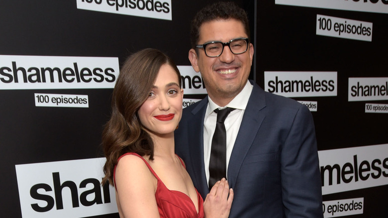 Emmy Rossum and Sam Esmail posing