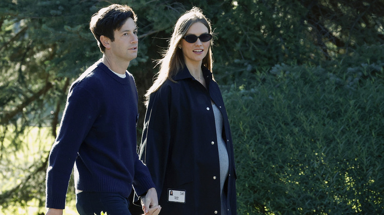 Pregnant Karlie Kloss walking with Josh Kushner