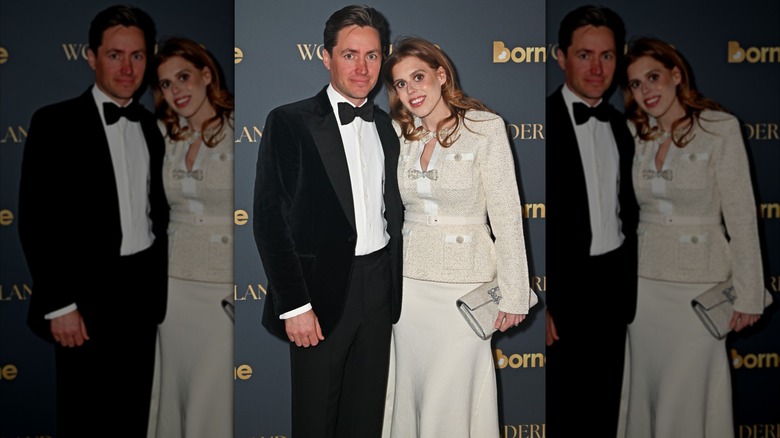 Edoardo Mapelli Mozzi and Princess Beatrice posing for photos at an event