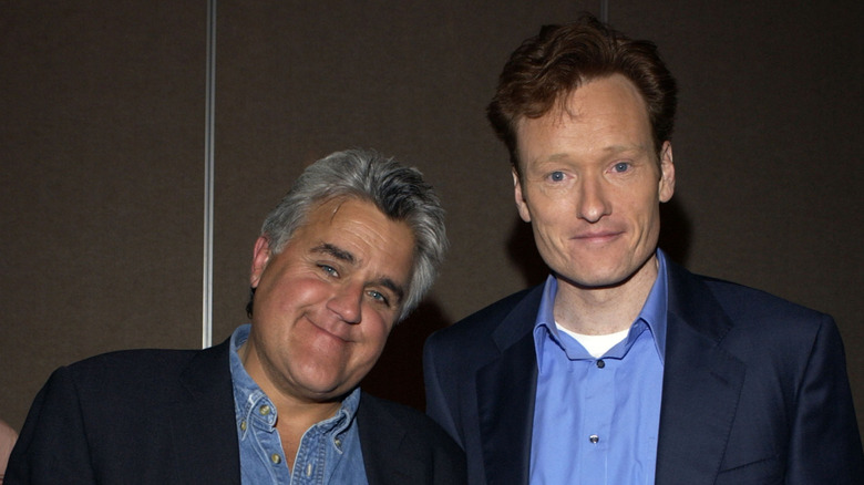 Jay Leno posing with Conan O'Brien
