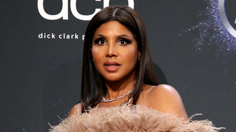 Toni Braxton tan tulle dress