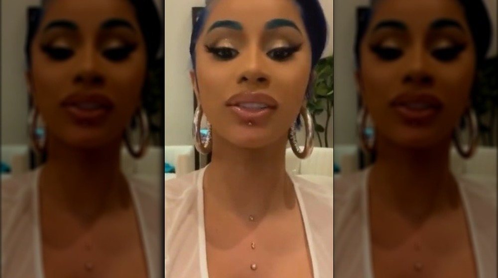 Cardi B's lip and chest piercings
