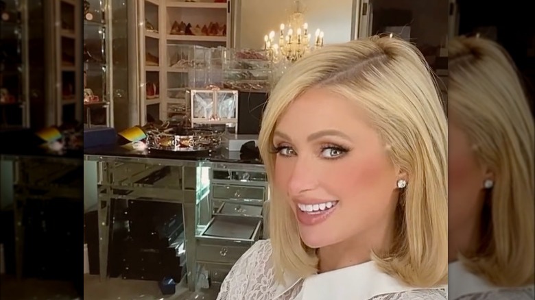 Paris Hilton smiling in her closet