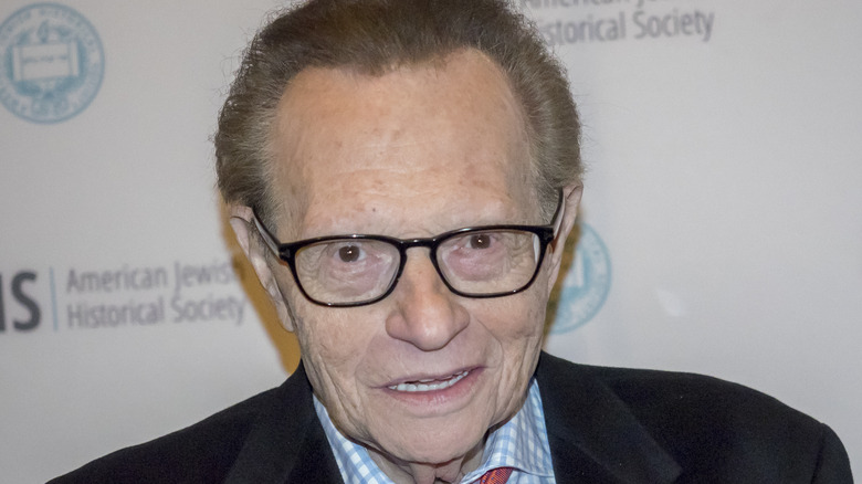 Larry King smiling