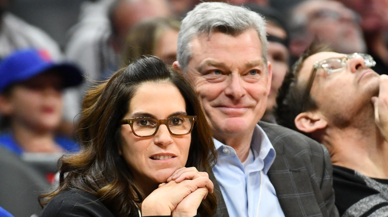Jami Gertz and Antony Ressler courtside