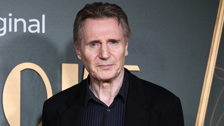 Liam Neeson black suit at event