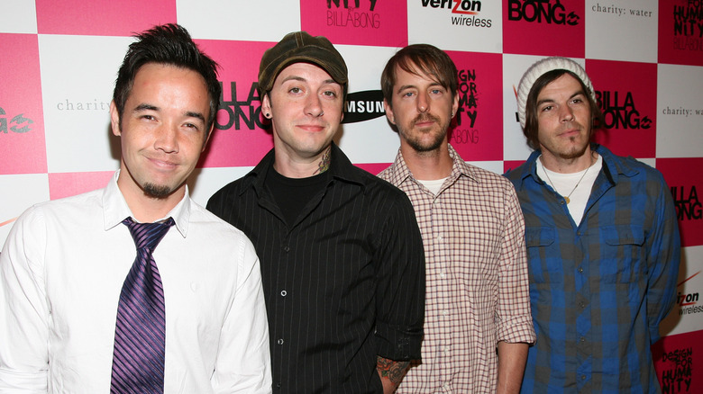 Hoobastank standing in front of a checkered wall