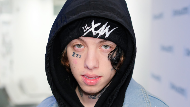 Lil Xan wearing a hoodie