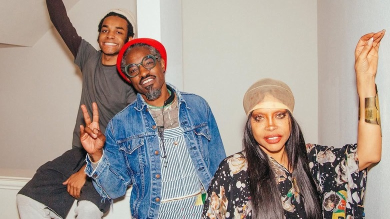 Seven Benjamin, André 3000, and Erykah Badu posing for a photo
