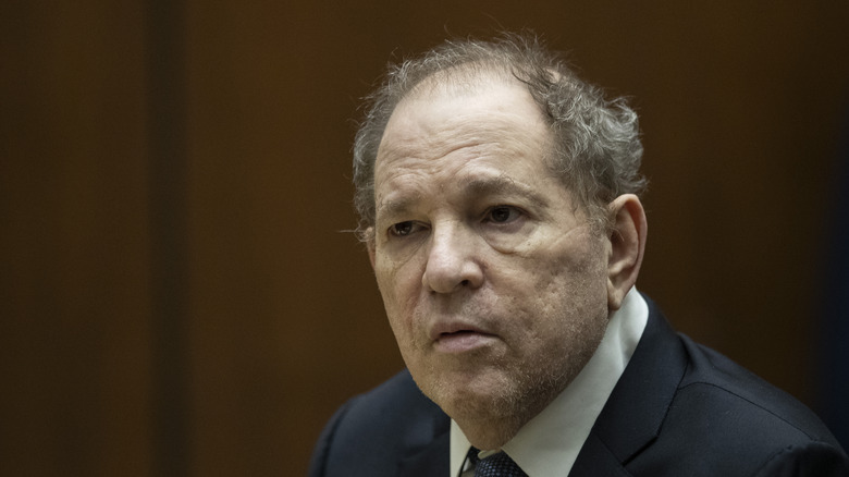 Harvey Weinstein sitting in a court room
