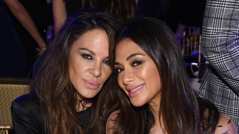 Robin Antin smiling with Nicole Scherzinger