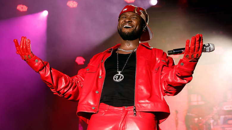 Usher performs on stage