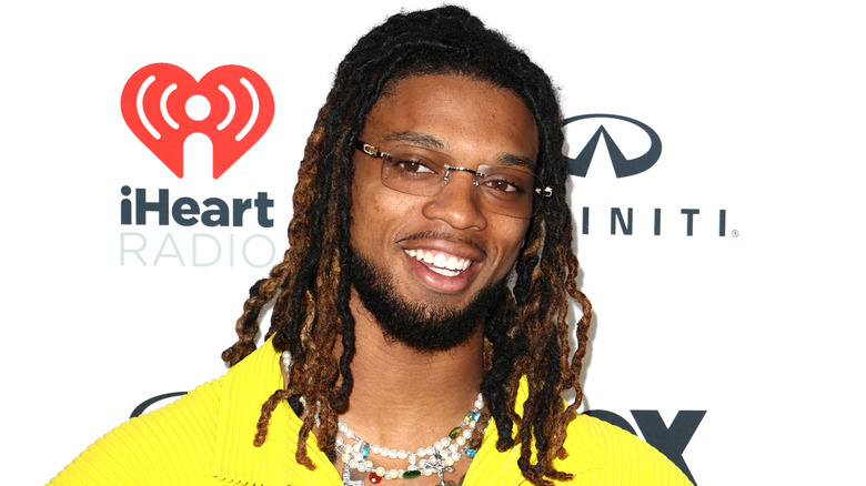 Damar Hamlin smiling in yellow