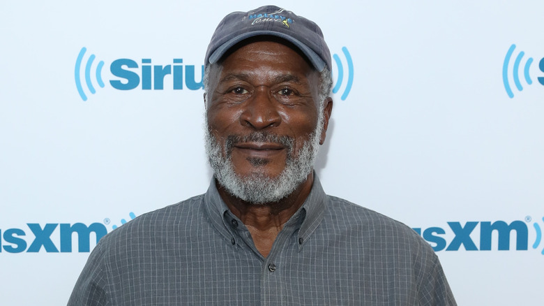 John Amos smiling with hat in New York in 2017