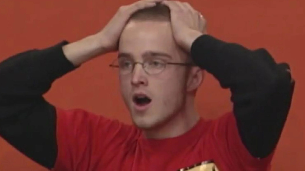 Aaron Paul on The Price is Right, hands to his head