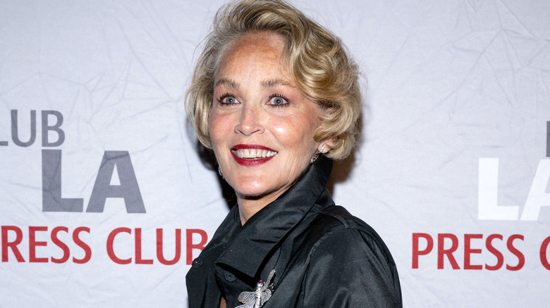 Sharon Stone smiling in black gown