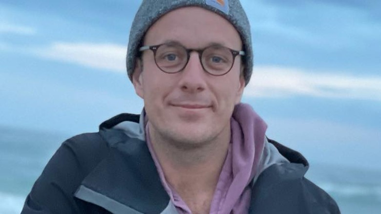 William Friend smiling on beach