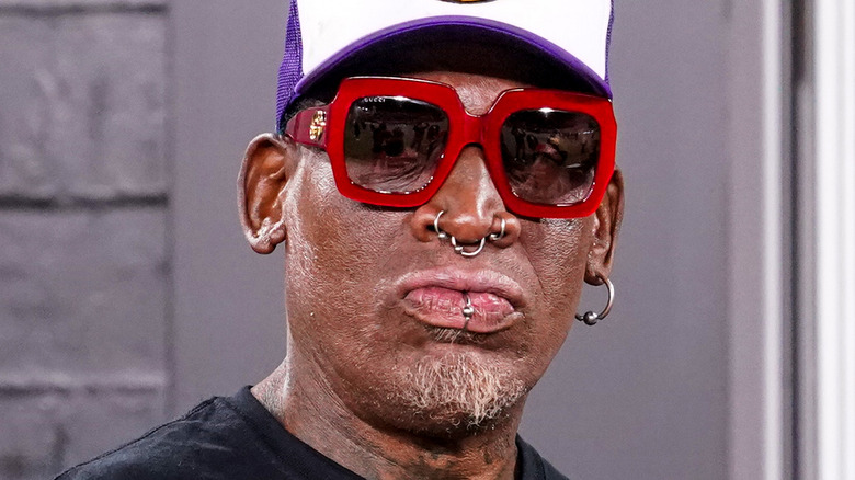 Dennis Rodman in red glasses