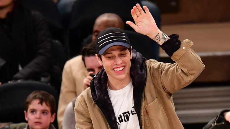 Pete Davidson waving