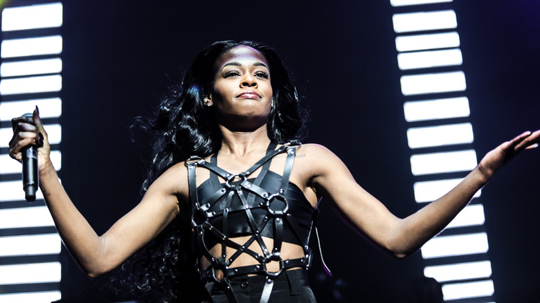 Azealia Banks with arms outstretched