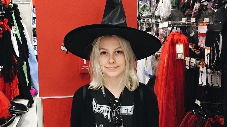 Phoebe Bridgers wearing witch hat